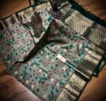 Kanjivaram silk saree - Mehendi Green Silk Saree with Ikat-Inspired Floral Design and Grand Gold Zari Pallu