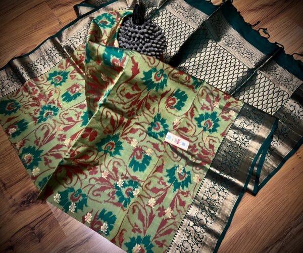 Pista Green Silk Saree with Ikat-Inspired Floral Motifs and Rich Gold Zari Border & Pallu