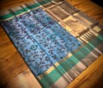 Powder Blue Silk Saree with Floral Vines and Gold Zari Border