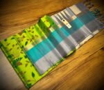 Lime Green Silk Saree with Floral Motifs and Gold Zari Border