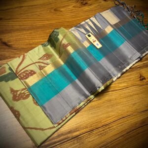 Pista Green Floral Silk Saree with Gold Zari Border and Teal Highlights