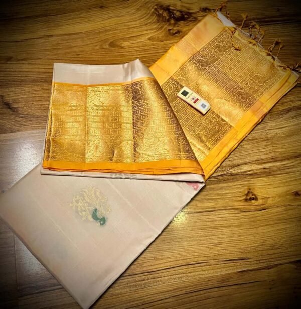 Ivory Elegance Silk Saree with Regal Gold Zari Border