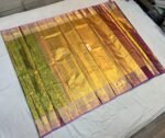 Royal Gold Zari Silk Saree with Green Brocade Panel and Purple Temple Border