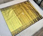 Timeless Gold Zari Silk Saree with Green Undertones and Purple Floral Border