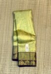 Timeless Gold Zari Silk Saree with Green Undertones and Purple Floral Border