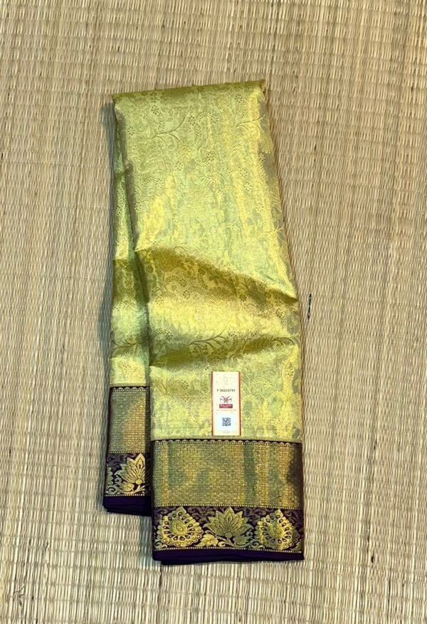 Timeless Gold Zari Silk Saree with Green Undertones and Purple Floral Border