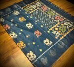 Midnight Teal Satin Saree with Artistic Elephant & Peacock Weave