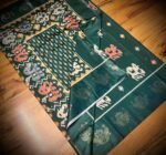 Emerald Green Satin Saree with Royal Elephant Motifs & Zari Peacock Border