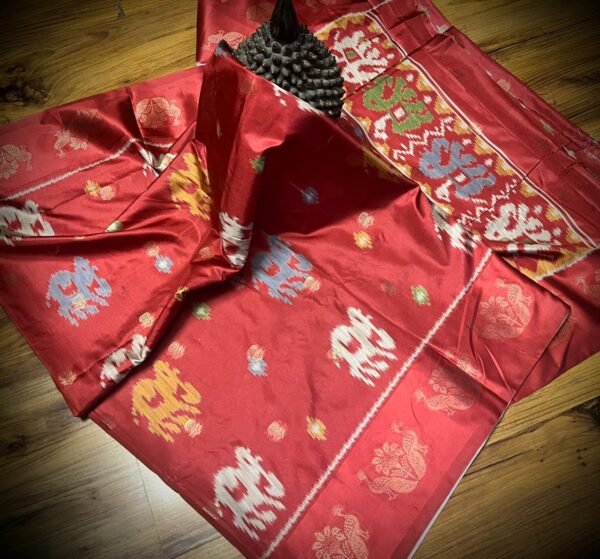 Radiant Ruby Red Satin Saree with Multicolor Elephant Motifs & Zari Peacock Border