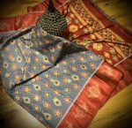 Slate Grey & Rust Satin Saree with Traditional Ikat Motifs and Zari Border