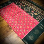 Rani Pink & Bottle Green Satin Saree with Ikat Motifs and Zari Peacock Border