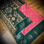 Rani Pink & Bottle Green Satin Saree with Ikat Motifs and Zari Peacock Border