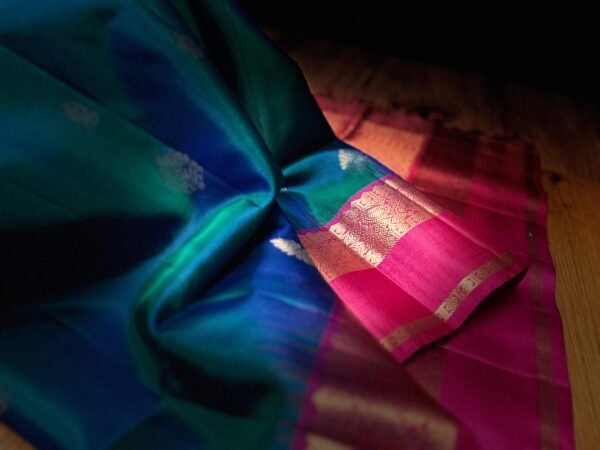 Royal Peacock Blue & Rani Pink Gold Zari Gap Border Silk Saree