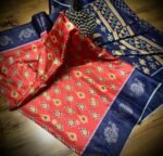 Vermilion Red & Royal Blue Satin Saree with Ikat Motifs and Zari Peacock Border
