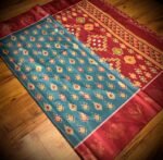 Teal Blue & Maroon Satin Saree with Ikat Motifs and Traditional Zari Border