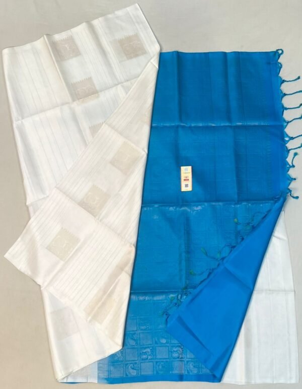 Elegant White Silk Saree with Teal Blue Pallu and Subtle Gold Zari Work (Copy)