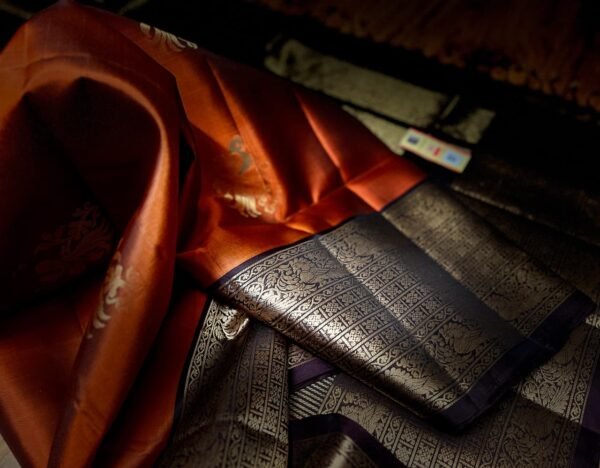 Burnt Orange Kanchipuram Silk Saree with Antique Gold Zari Border and Wine Pallu