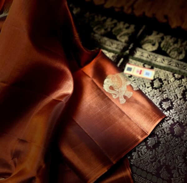 Burnt Orange Kanchipuram Silk Saree with Gold Zari Meena Elephant Butta and Black Temple Border Pallu