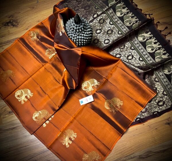 Burnt Orange Kanchipuram Silk Saree with Gold Zari Meena Elephant Butta and Black Temple Border Pallu