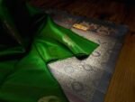 Emerald Green Kanchipuram Silk Saree with Gold Zari Pallu and Traditional elephant Motifs