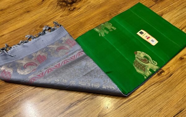 Emerald Green Kanchipuram Silk Saree with Gold Zari Pallu and Traditional elephant Motifs