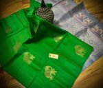 Emerald Green Kanchipuram Silk Saree with Gold Zari Pallu and Traditional elephant Motifs