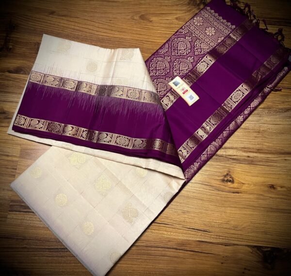 Ivory White Kanchipuram Silk Saree with Gold Zari Buttas and Royal Purple Contrast Pallu