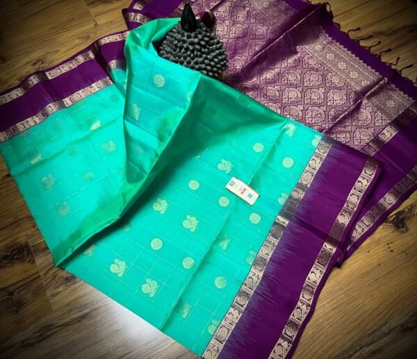 Sea Green Kanchipuram Silk Saree with Gold Zari Buttas and Royal Purple Contrast Pallu