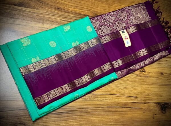 Sea Green Kanchipuram Silk Saree with Gold Zari Buttas and Royal Purple Contrast Pallu