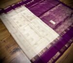 Ivory White Kanchipuram Silk Saree with Gold Zari Buttas and Royal Purple Contrast Pallu