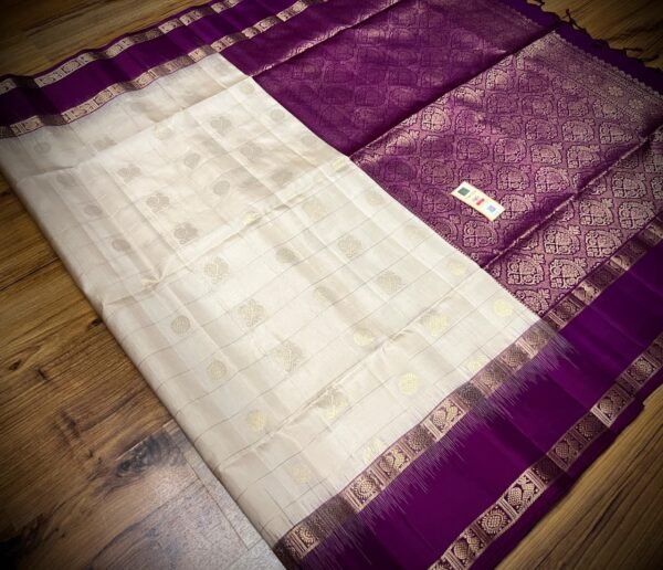 Ivory White Kanchipuram Silk Saree with Gold Zari Buttas and Royal Purple Contrast Pallu