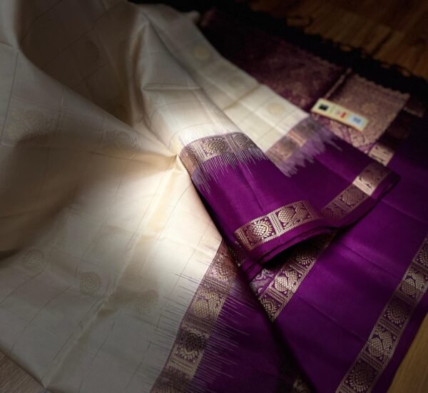 Ivory White Kanchipuram Silk Saree with Gold Zari Buttas and Royal Purple Contrast Pallu