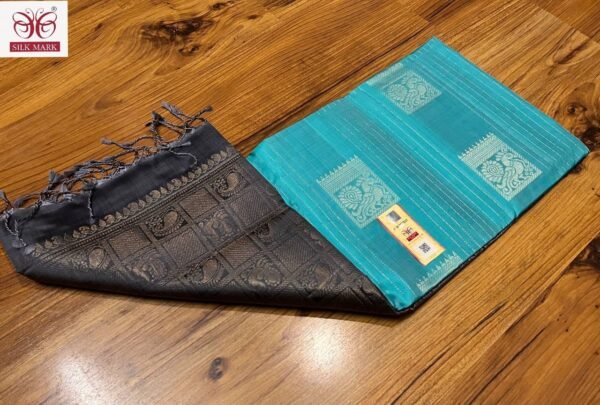 Teal Blue Silk Saree with Antique Gold Zari Motifs and Charcoal Pallu