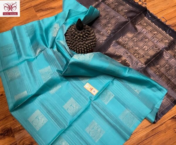 Teal Blue Silk Saree with Antique Gold Zari Motifs and Charcoal Pallu