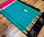 Teal Blue Silk Saree with Black & Gold Zari Pallu and Contrast Pink Border