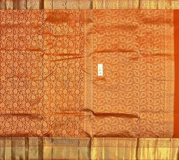 Burnt Orange Silk Saree with Intricate Gold Zari Floral Weave and Grand Traditional Border