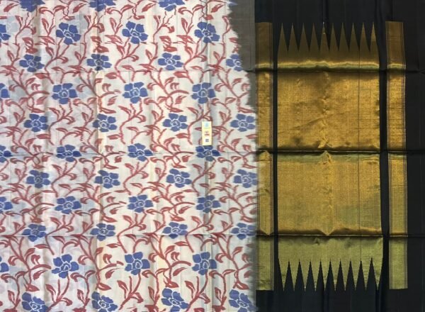 The white Garden & Midnight Gold Pochampally Silk Saree