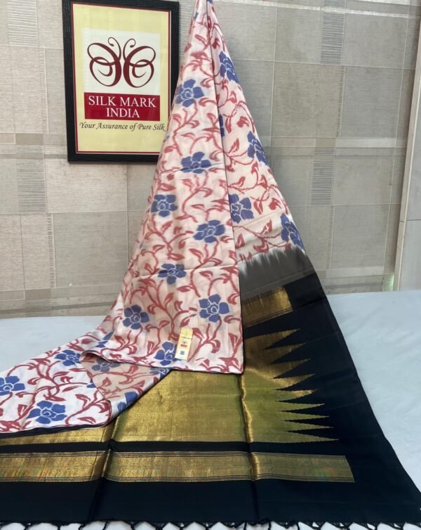 The white Garden & Midnight Gold Pochampally Silk Saree