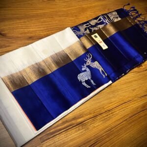Elegant White Gold Zari Silk Saree with Royal Blue Deer Motif Border