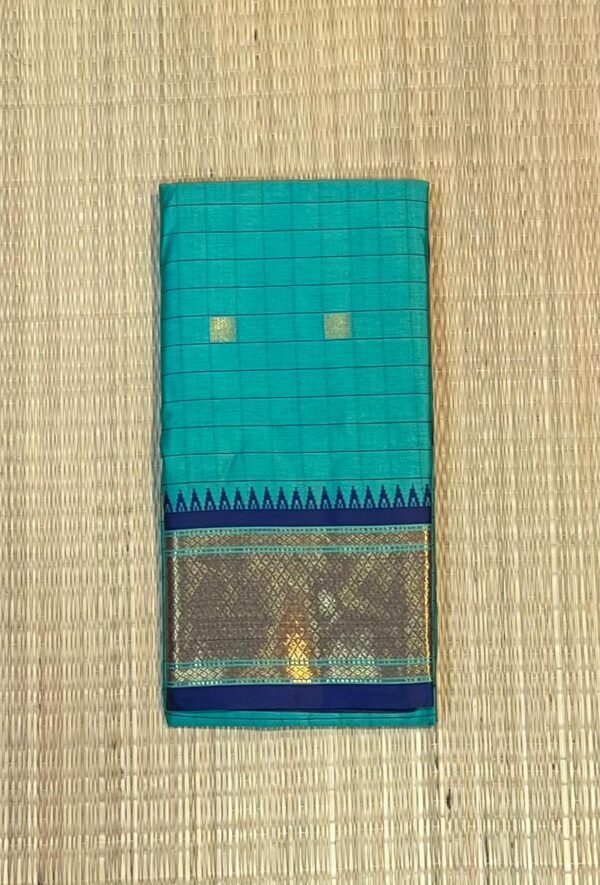 Azure Zari Fusion: Focuses on the blend of the cotton-mix texture and the metallic gold sheen