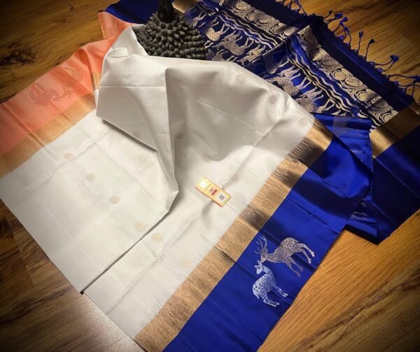 Elegant White Gold Zari Silk Saree with Royal Blue Deer Motif Border