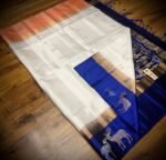 Elegant White Gold Zari Silk Saree with Royal Blue Deer Motif Border