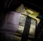 Elegant Mauve Gold Zari Silk Saree with Classic Black Border