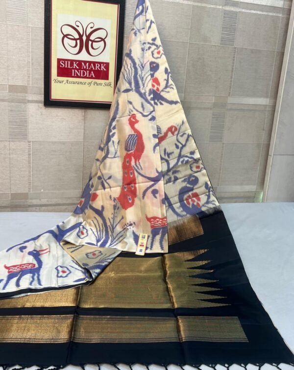 Elegant Ivory Pochampally Ikat Saree with Peacock & Deer Motifs and Rich Gold Zari Pallu