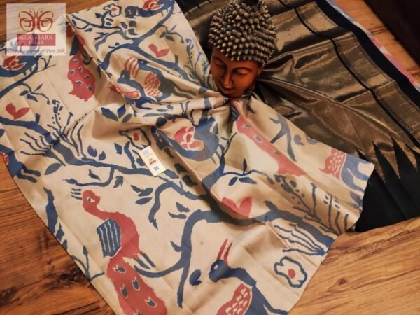 Elegant Ivory Pochampally Ikat Saree with Peacock & Deer Motifs and Rich Gold Zari Pallu