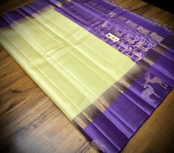 Graceful Lemon Yellow Gold Zari Silk Saree with Lavender Deer Motif Border