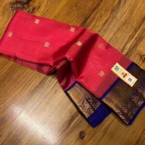 Vibrant Coral Pink Silk Saree with Royal Blue Korvai Border & Gold Zari Buttas