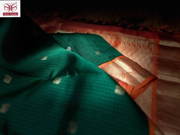Rich Emerald Green Silk Saree with Orange Korvai Border & Gold Zari Buttas