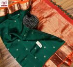 Rich Emerald Green Silk Saree with Orange Korvai Border & Gold Zari Buttas