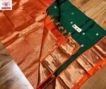 Rich Emerald Green Silk Saree with Orange Korvai Border & Gold Zari Buttas